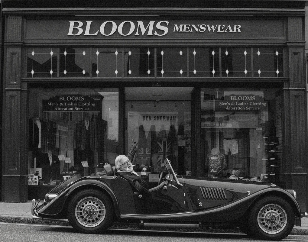 Vintage car in front of Blooms Menswear store
